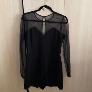 Blk romper from BCBGgen. Perfect for a night out or holiday events! NEVER WORN.